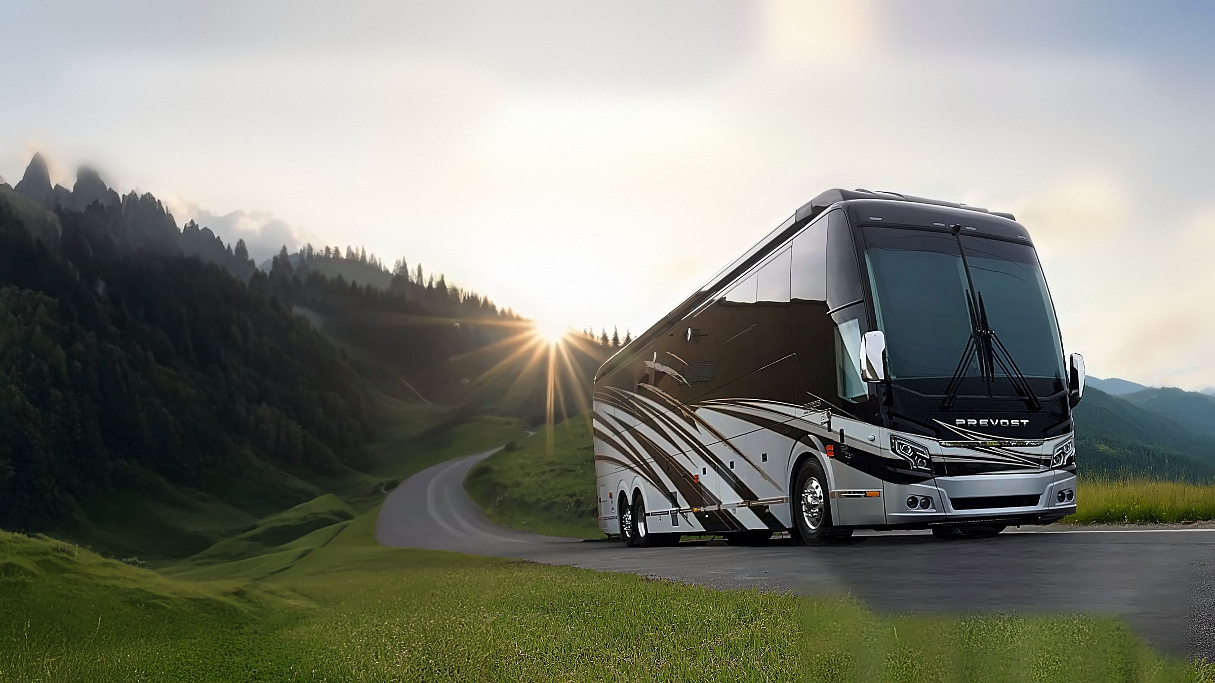 Luxury Prevost motorcoach on a mountain road